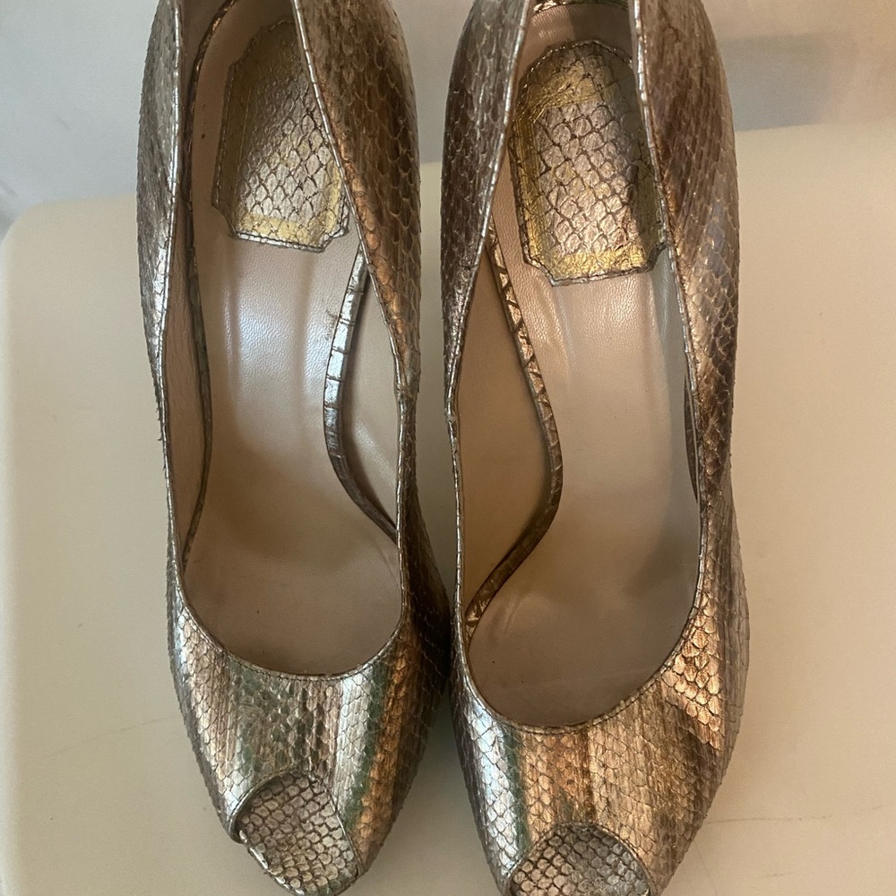 Women’s Dior open toe high heels. Pre owned but still looks good.